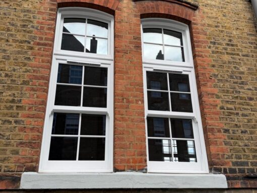 Two windows with new frames and repainted sill