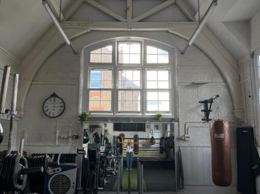 Gym looking towards the arched window