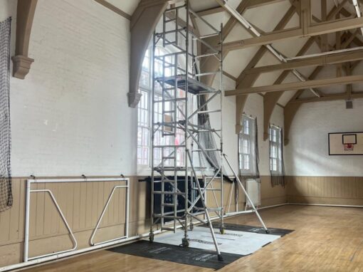 Sports hall with the scaffold tower up, works in progress