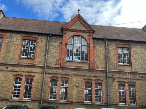 The front elevation before the works, with the original windows throughout