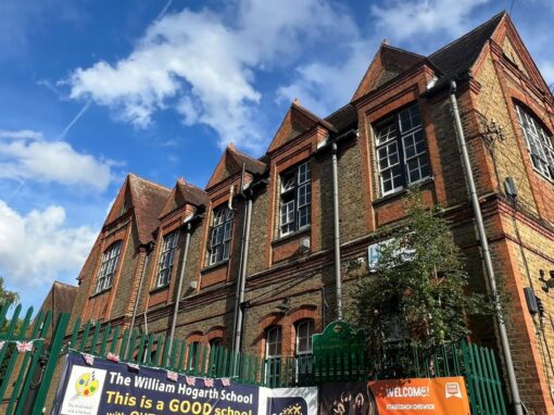 The side elevation before the works, with the original dark-framed windows
